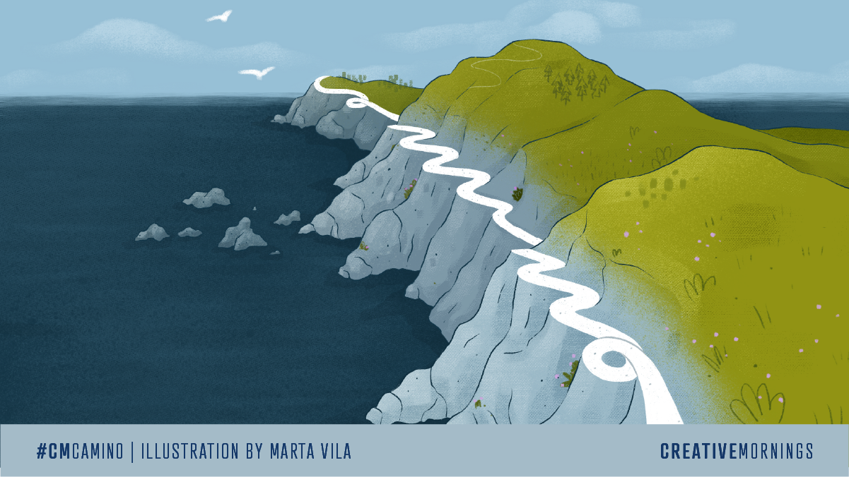 Illustrated coastal landscape with a winding white path along steep gray cliffs beside a deep blue ocean, green hills above with small flowers and birds flying overhead. Text at the bottom reads &ldquo;#CMCAMINO | Illustration by Marta Vila&rdquo; and &ldquo;CreativeMornings.&rdquo;