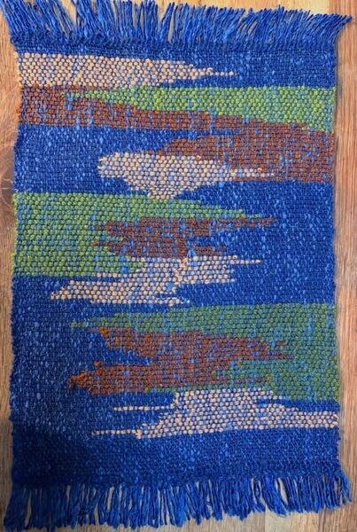 This is a return to weaving after a 26 year hiatus. I was testing my rigid heddle loom and locating what was not working while testing my hand at the process again. The loom and it's new stand are shipshape now and the weaving "a table accent" as they seem to be called these days is finding a home at my daughter's.
