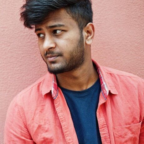 Portrait young stylish indian man model isolated pink wall background111