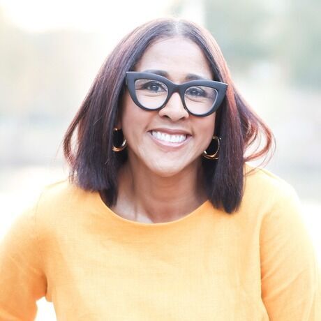 Zoraida yellow dress headshot