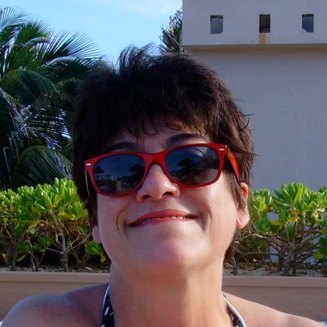 Virginia headshot with glasses cancun