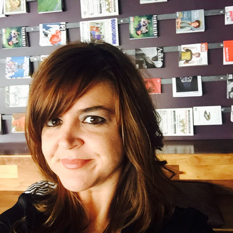 Krissi with magazines