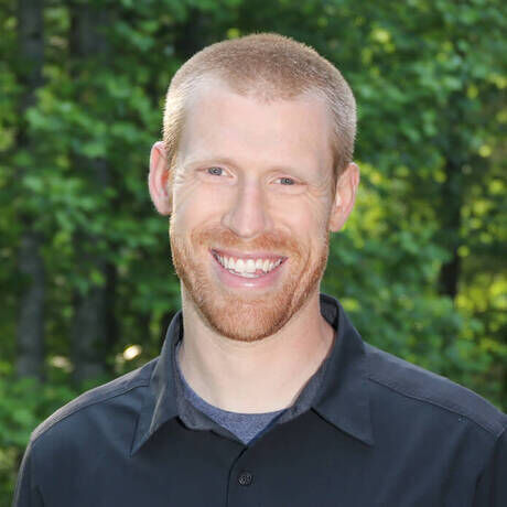 7u3a0333 john headshot copy tiny