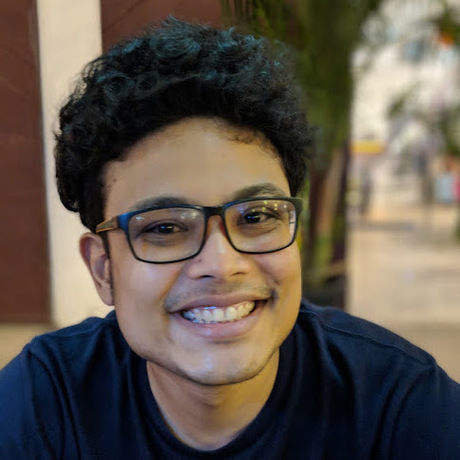 Hakim smiling