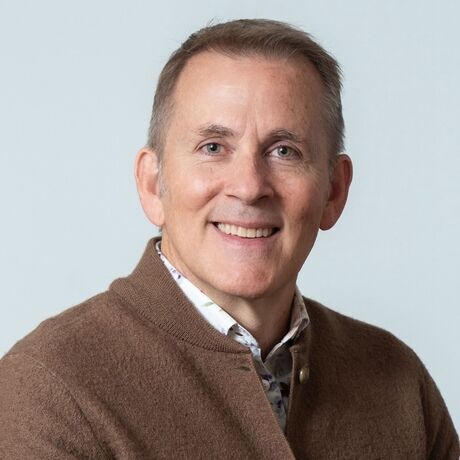 Headshot w brown sweater sqare4x4