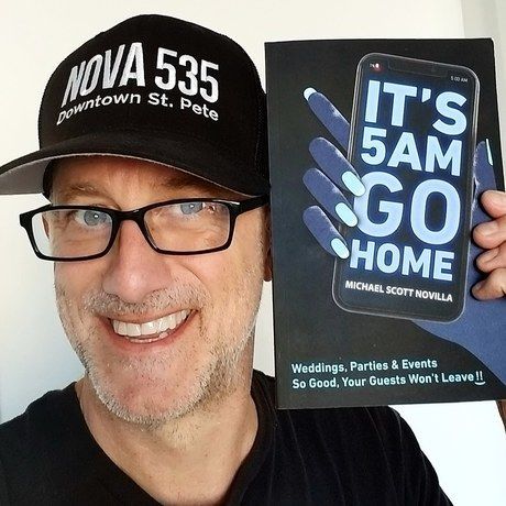 2019 08 22 michael scott novilla headshot with book it s 5 am go home