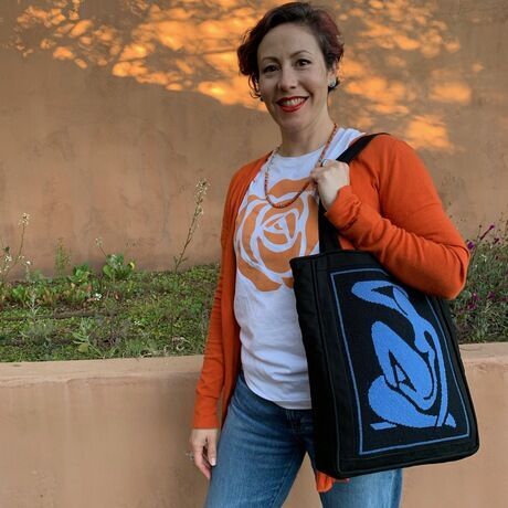 With needlepoint bag