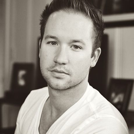 White vneck headshot 1