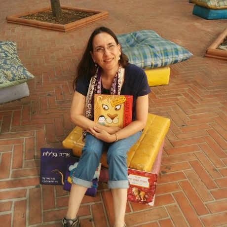Ruth schiller at city hall with books
