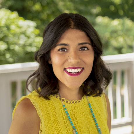 Moni headshot yellow small