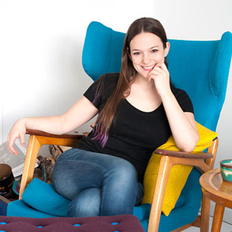 Mikkelpaige headshot blue chair