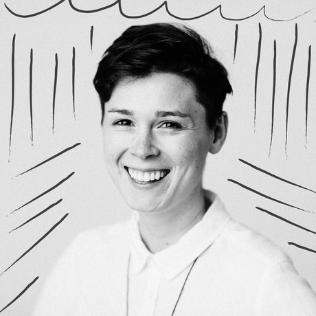 Smiling headshot with scribbles