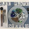 Small blue plate studio placemat