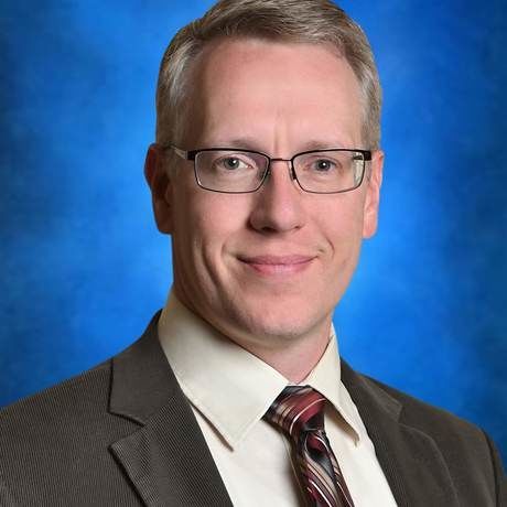 Conx19 headshot  glasses 