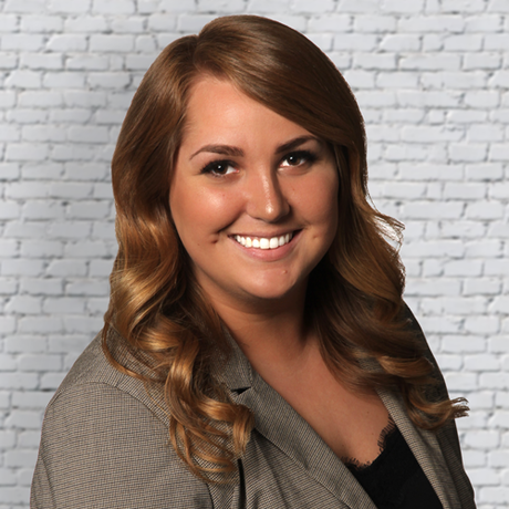 Alixgardner headshot brickbackground smallsquare
