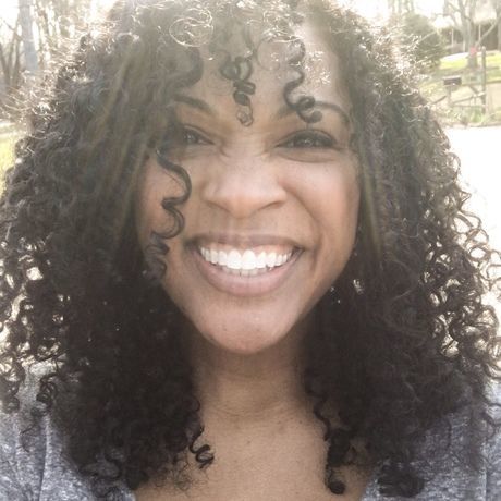 Photo of kim smiling