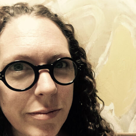 Julie headshot orangecell