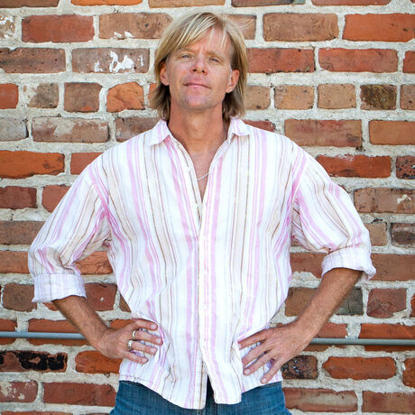 Ck on brick wall promo shot jim brock photo