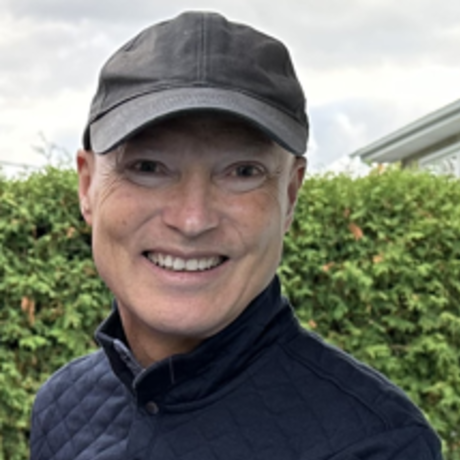 Mdm headshot backyard 2023