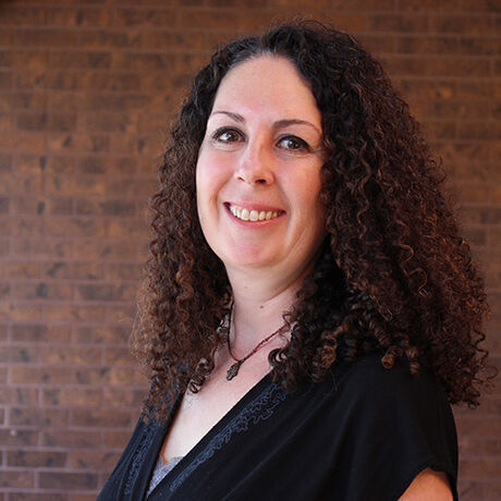 Alaina green headshot 500px