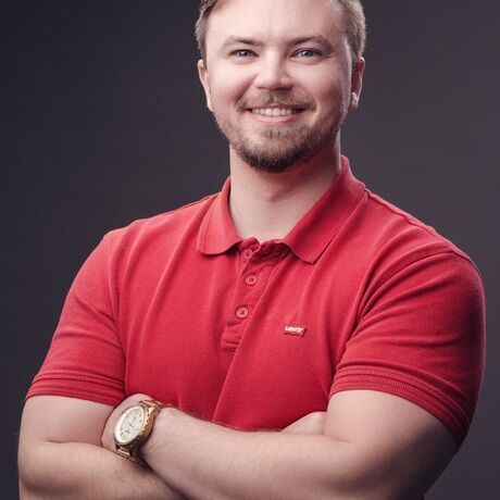 Headshot   crossed arms red polo