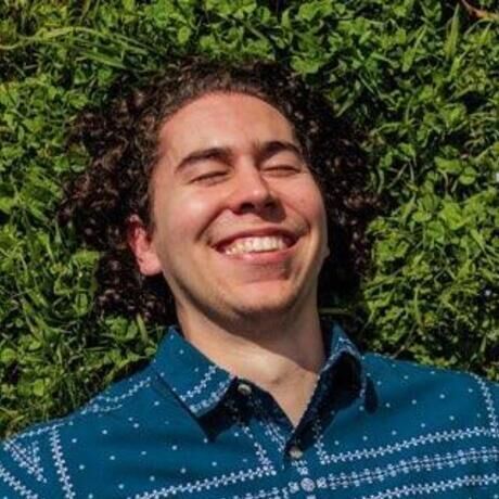 Alex lying in the grass